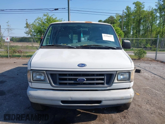 1999 Ford Econoline Cargo with VIN 1FTRE1420XHA34056, listed as a IAAI auction lot 41998411 with 236,267 mi miles. Bid and sale history available at carsss.com. Image 12.