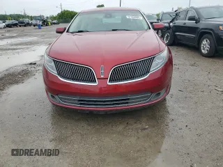2013 Lincoln MKS EcoBoost with VIN 1LNHL9FTXDG606799, listed as a Copart auction lot 57469995 with 80,168 mi miles and Salvage title. Bid and sale history available at DreamBid. Image 5.