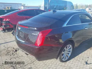 2017 Cadillac ATS Luxury AWD z VIN 1G6AH1RX3H0125723, wystawiony jako IAAI lot #42106626 z przebiegiem 174 119 mil mil oraz . Historia ofert i sprzedaży dostępna na DreamBid. Obrazek 4.
