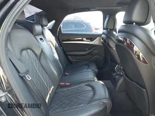 2011 Audi A8 with VIN WAUAVAFD6BN023937, listed as a IAAI auction lot 41288464 with 158,127 mi miles and . Bid and sale history available at DreamBid. Image 8.