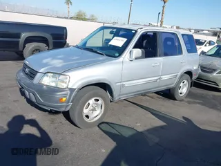 1999 Honda CR-V EX with VIN JHLRD1861XC007657, listed as a IAAI auction lot 42004759 with 180,078 mi miles. Bid and sale history available at carsss.com. Image 2.
