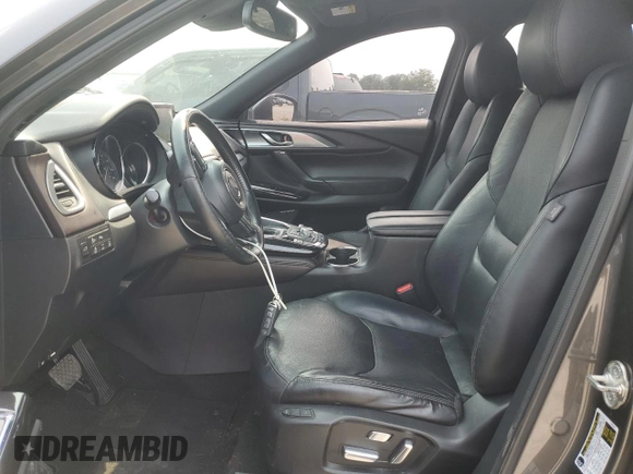 2017 Mazda CX-9 Grand Touring z VIN JM3TCADYXH0138805, wystawiony jako Copart lot #59201915 z przebiegiem 147 896 mil mil oraz Czysty tytuł • Clean title. Historia ofert i sprzedaży dostępna na DreamBid. Obrazek 7.