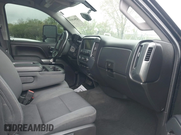 2014 Chevrolet Silverado 1500 LT with VIN 1GCVKREC4EZ327320, listed as a IAAI auction lot 42063939 with 132,317 mi miles and . Bid and sale history available at DreamBid. Image 5.