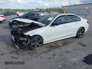 2019 BMW 3 Series 330i z VIN 3MW5R1J57K8A03673, wystawiony jako IAAI lot #41672322 z przebiegiem 72 083 mil mil oraz . Historia ofert i sprzedaży dostępna na DreamBid. Obrazek 17.