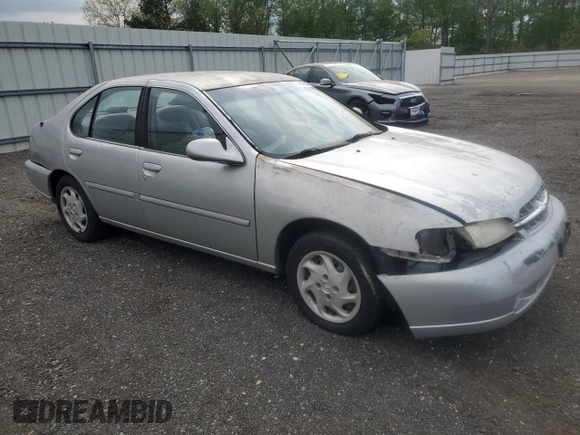 1999 Nissan Altima XE z VIN 1N4DL01D1XC202466, wystawiony jako Copart lot #54548015 z przebiegiem 131 409 mil mil oraz Szkoda całkowita • Salvage title. Historia ofert i sprzedaży dostępna na DreamBid. Obrazek 4.