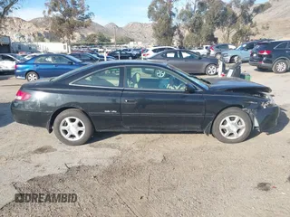 1999 Toyota Solara SE with VIN 2T1CF22P1XC119998, listed as a IAAI auction lot 41602942 with 94,392 mi miles and . Bid and sale history available at carsss.com. Image 13.