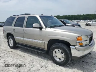 2003 GMC Yukon SLT z VIN 1GKEC13Z53J281504, wystawiony jako Copart lot #57526355 z przebiegiem 268 306 mil mil oraz Szkoda całkowita • Salvage title. Historia ofert i sprzedaży dostępna na DreamBid. Obrazek 4.