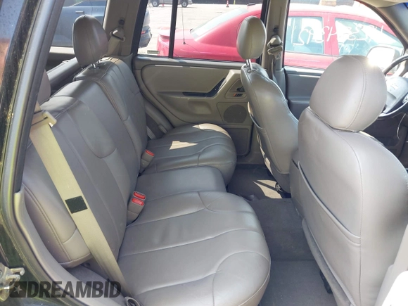 2001 Jeep Grand Cherokee Laredo with VIN 1J4GW48S31C558946, listed as a IAAI auction lot 42384392 with 252,393 mi miles and . Bid and sale history available at DreamBid. Image 8.