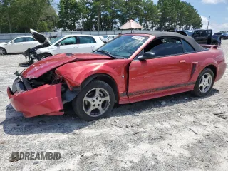 2002 Ford Mustang Deluxe z VIN 1FAFP44492F189859, wystawiony jako Copart lot #60030445 z przebiegiem 68 427 mil mil oraz Szkoda całkowita • Salvage title. Historia ofert i sprzedaży dostępna na DreamBid. Obrazek 1.