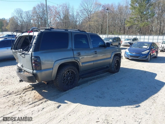 2002 Chevrolet Tahoe LT with VIN 1GNEK13Z22J279570, listed as a IAAI auction lot 41858543 with 378,318 mi miles. Bid and sale history available at carsss.com. Image 4.