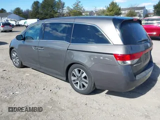 2016 Honda Odyssey Touring Elite with VIN 5FNRL5H90GB128006, listed as a IAAI auction lot 41695438 with 133,337 mi miles. Bid and sale history available at carsss.com. Image 3.