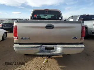 1999 Ford Super Duty F-250 XL with VIN 1FTNW21F6XEC59527, listed as a Copart auction lot 84740234 with 265,651 mi miles and Salvage Title. Bid and sale history available at carsss.com. Image 6.