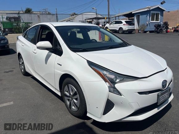 2018 Toyota Prius Two with VIN JTDKARFU6J3060322, listed as a IAAI auction lot 42273299 with 113,523 mi miles and . Bid and sale history available at DreamBid. Image 1.
