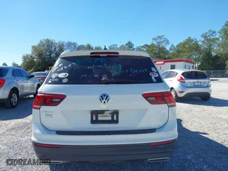 2021 Volkswagen Tiguan S with VIN 3VV1B7AX9MM056025, listed as a IAAI auction lot 41352521 with 98,944 mi miles. Bid and sale history available at carsss.com. Image 16.