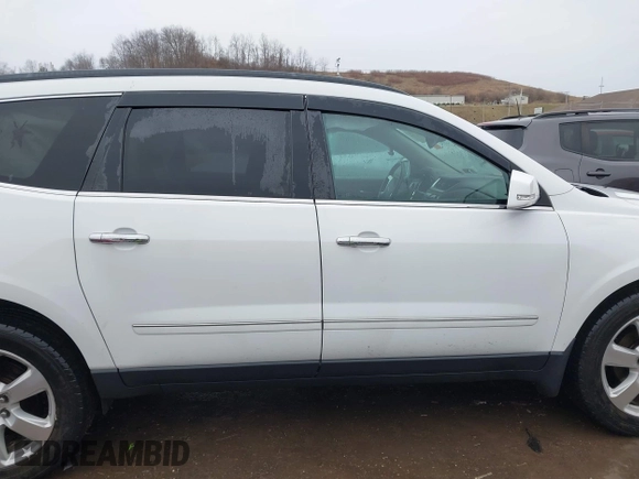 2017 Chevrolet Traverse Premier with VIN 1GNKVJKD5HJ324803, listed as a IAAI auction lot 41464714 with 98,753 mi miles and . Bid and sale history available at DreamBid. Image 13.