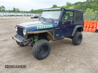 2000 Jeep Wrangler SE with VIN 1J4FA29P4YP740134, listed as a IAAI auction lot 42772253 with 168,656 mi miles and . Bid and sale history available at DreamBid. Image 2.