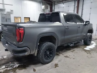 2021 GMC Sierra 1500 AT4 with VIN 3GTP9EEL1MG284910, listed as a IAAI auction lot 41023969 with 53,209 mi miles. Bid and sale history available at carsss.com. Image 4.