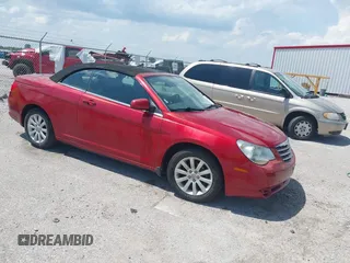 2010 Chrysler Sebring Touring with VIN 1C3BC5ED2AN169535, listed as a IAAI auction lot 42563975 with 86,993 mi miles and . Bid and sale history available at DreamBid. Image 1.