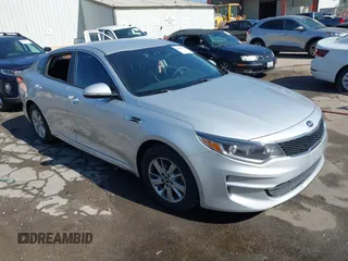 2016 Kia Optima LX z VIN KNAGT4L39G5117721, wystawiony jako IAAI lot #42308070 z przebiegiem 113 987 mil mil oraz . Historia ofert i sprzedaży dostępna na DreamBid. Obrazek 1.