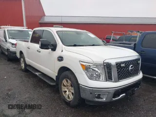 2017 Nissan Titan SV with VIN 1N6AA1E58HN536525, listed as a IAAI auction lot 41888005 with 75,933 mi miles and . Bid and sale history available at DreamBid. Image 1.