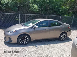 2019 Toyota Corolla L z VIN 5YFBURHE5KP861233, wystawiony jako IAAI lot #42388008 z przebiegiem 131 243 mil mil oraz . Historia ofert i sprzedaży dostępna na DreamBid. Obrazek 14.