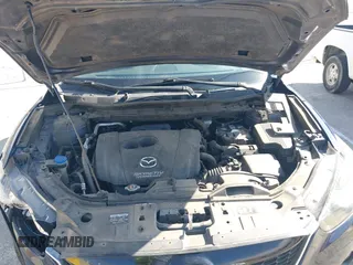 2014 Mazda CX-5 Grand Touring with VIN JM3KE2DY7E0376389, listed as a IAAI auction lot 42014946 with 126,081 mi miles. Bid and sale history available at carsss.com. Image 10.
