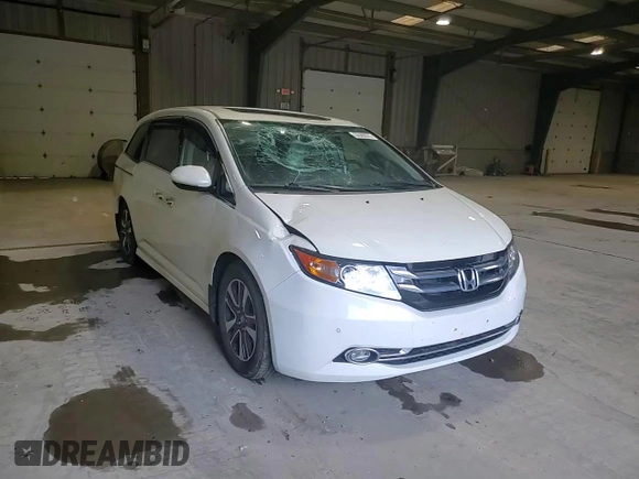 2016 Honda Odyssey Touring Elite with VIN 5FNRL5H91GB070424, listed as a Copart auction lot 55583075 with 115,709 mi miles and Salvage Title. Bid and sale history available at DreamBid. Image 14.