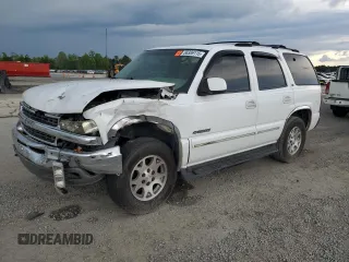 2001 Chevrolet Tahoe LT z VIN 1GNEK13TX1R176358, wystawiony jako Copart lot #56389115 z przebiegiem 241 898 mil mil oraz Szkoda całkowita • Salvage title. Historia ofert i sprzedaży dostępna na DreamBid. Obrazek 1.