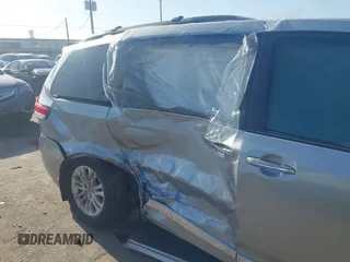 2014 Toyota Sienna XLE with VIN 5TDYK3DC8ES423450, listed as a IAAI auction lot 41972128 with 145,374 mi miles. Bid and sale history available at carsss.com. Image 6.