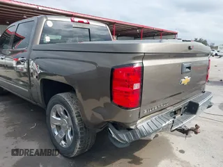 2015 Chevrolet Silverado 1500 LTZ with VIN 3GCPCSEC6FG408754, listed as a IAAI auction lot 41514369 with 140,928 mi miles and . Bid and sale history available at DreamBid. Image 17.