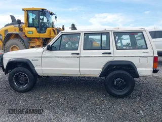 1996 Jeep Cherokee SE with VIN 1J4FJ28S3TL241251, listed as a IAAI auction lot 42073050 with 156,523 mi miles and . Bid and sale history available at DreamBid. Image 14.