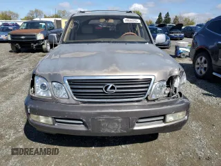 2000 Lexus LX 470 z VIN JT6HT00W9Y0120042, wystawiony jako Copart lot #49644355 z przebiegiem 188 992 mil mil oraz Czysty tytuł • Clean title. Historia ofert i sprzedaży dostępna na DreamBid. Obrazek 5.