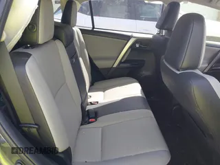 2016 Toyota RAV4 Hybrid Limited with VIN JTMDJREV7GD047729, listed as a IAAI auction lot 41833765 with 114,830 mi miles. Bid and sale history available at carsss.com. Image 8.