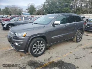 2017 Jeep Grand Cherokee Overland with VIN 1C4RJECG2HC903366, listed as a Copart auction lot 44140155 with 102,459 mi miles and Salvage Title. Bid and sale history available at carsss.com. Image 1.