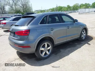 2015 Audi Q3 Premium Plus с VIN WA1EFCFS6FR010285, выставлен на аукционе IAAI как лот 42202068 с пробегом 104 945 миль миль и . История ставок и продаж доступна на DreamBid. Изображение 4.