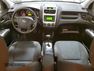 2009 Kia Sportage LX with VIN KNDJE723X97561560, listed as a Copart auction lot 49766995 with 130,623 mi miles and Salvage Title. Bid and sale history available at DreamBid. Image 8.