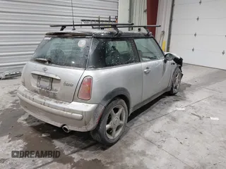 2002 MINI Hardtop with VIN WMWRC33422TC37296, listed as a IAAI auction lot 41385046 with 107,663 mi miles and . Bid and sale history available at DreamBid. Image 4.