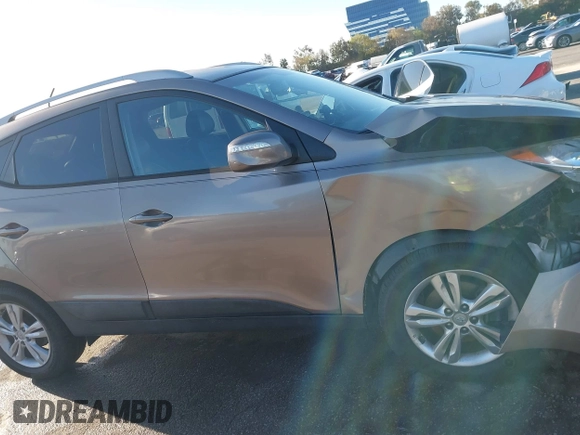 2013 Hyundai Tucson GLS with VIN KM8JU3AC0DU705782, listed as a IAAI auction lot 41804846 with 81,260 mi miles. Bid and sale history available at carsss.com. Image 13.