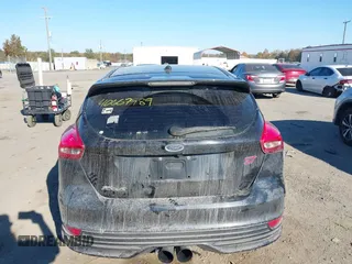 2018 Ford Focus ST with VIN 1FADP3L9XJL209180, listed as a IAAI auction lot 40667989 with 95,519 mi miles and . Bid and sale history available at DreamBid. Image 16.