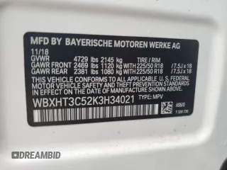 2019 BMW X1 xDrive28i with VIN WBXHT3C52K3H34021, listed as a Copart auction lot 64032535 with 30,752 mi miles and Salvage title. Bid and sale history available at DreamBid. Image 12.