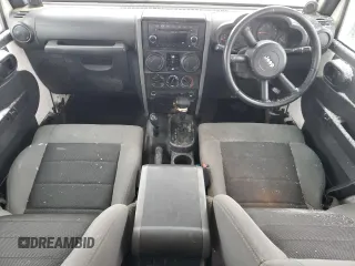 2009 Jeep Wrangler Unlimited X with VIN 1J4GZ39169L717946, listed as a Copart auction lot 87325954 with 0 mi miles and Salvage Title. Bid and sale history available at carsss.com. Image 8.