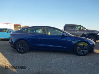 2022 Tesla Model 3 with VIN 5YJ3E1EA3NF190553, listed as a IAAI auction lot 41760731 with 90,268 mi miles. Bid and sale history available at carsss.com. Image 13.