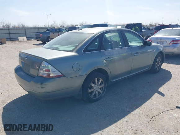 2008 Ford Taurus SEL with VIN 1FAHP27W38G109131, listed as a IAAI auction lot 41739444 with 147,848 mi miles. Bid and sale history available at carsss.com. Image 4.