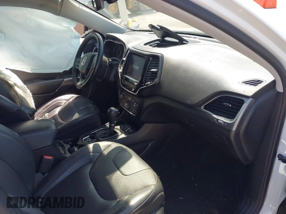 2019 Jeep Cherokee Limited z VIN 1C4PJLDB0KD396077, wystawiony jako IAAI lot #41972498 z przebiegiem 128 312 mil mil oraz . Historia ofert i sprzedaży dostępna na DreamBid. Obrazek 5.