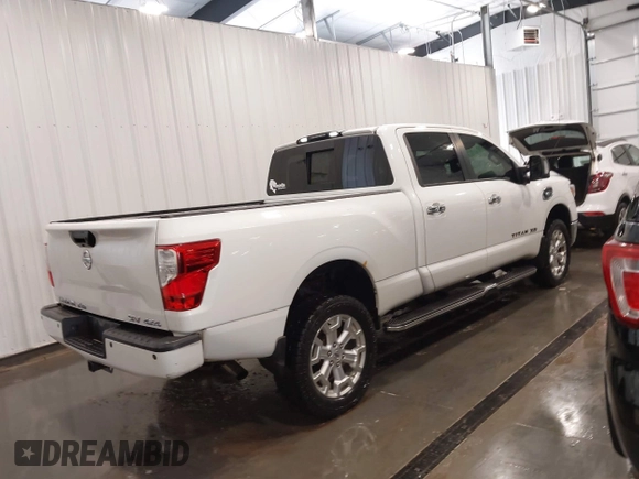 2016 Nissan Titan XD S with VIN 1N6AA1F46GN510414, listed as a IAAI auction lot 41882144 with 237,224 mi miles. Bid and sale history available at carsss.com. Image 4.