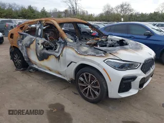 2022 BMW X6 xDrive40i z VIN 5UXCY6C04N9J78418, wystawiony jako IAAI lot #41877931 z przebiegiem Nie podano mil oraz . Historia ofert i sprzedaży dostępna na DreamBid. Obrazek 1.