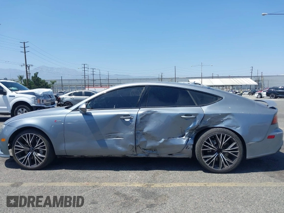 2018 Audi A7 Premium Plus z VIN WAUW3AFC1JN026763, wystawiony jako IAAI lot #42359297 z przebiegiem 108 937 mil mil oraz . Historia ofert i sprzedaży dostępna na DreamBid. Obrazek 15.