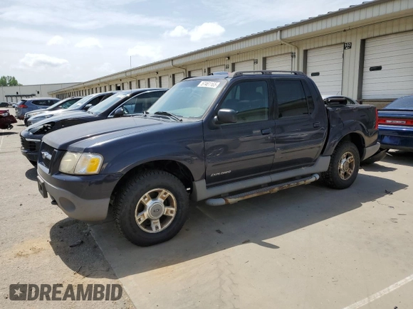 2001 Ford Explorer Sport Trac z VIN 1FMZU77E81UA92437, wystawiony jako Copart lot #57461165 z przebiegiem 275 633 mil mil oraz Czysty tytuł • Clean title. Historia ofert i sprzedaży dostępna na DreamBid. Obrazek 1.