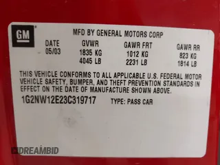 2003 Pontiac Grand Am GT with VIN 1G2NW12E23C319717, listed as a IAAI auction lot 41540987 with 195,850 mi miles. Bid and sale history available at carsss.com. Image 9.