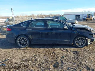 2020 Ford Fusion Hybrid Titanium with VIN 3FA6P0RU9LR141476, listed as a IAAI auction lot 41472921 with 84,433 mi miles. Bid and sale history available at carsss.com. Image 14.